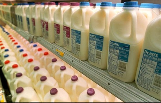 The federal government's top antitrust investigator told hundreds of farmers, lobbyists at a hearing Friday in Madison, Wis., that the Department of Justice is keeping close watch on the nation's dairy industry.